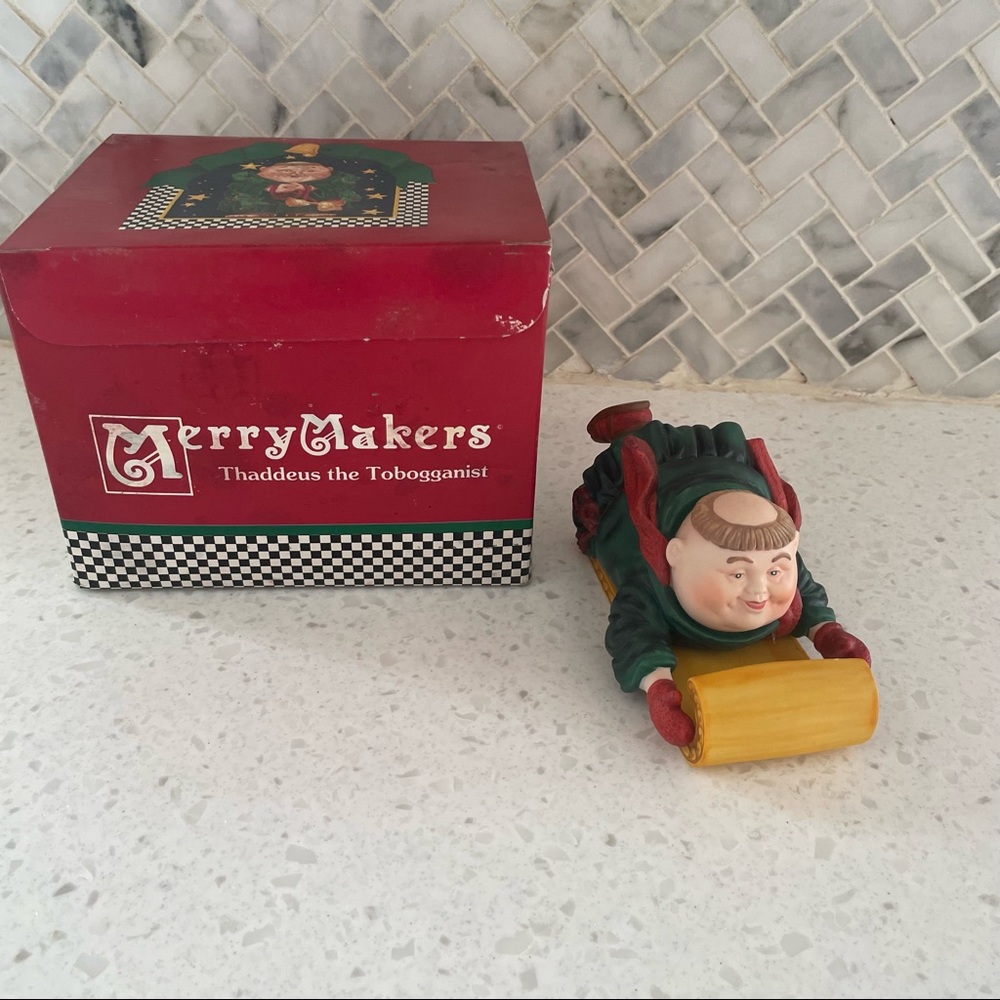 Merry Makers Dept 56 Thaddeus the Tobogganist with Box - flaw